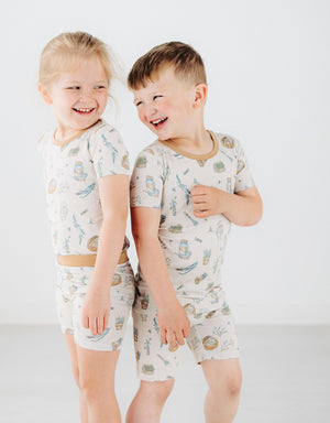 boy and girl playing together in Meadow Lane Kids Heirloom Homestead kids pajamas