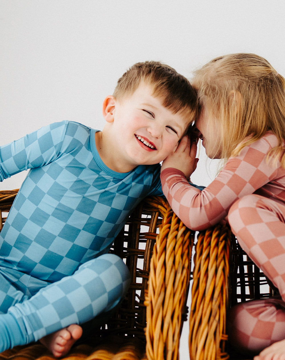 boy and girl wearing Meadow Lane Kids TENCEL checker kids pajamas