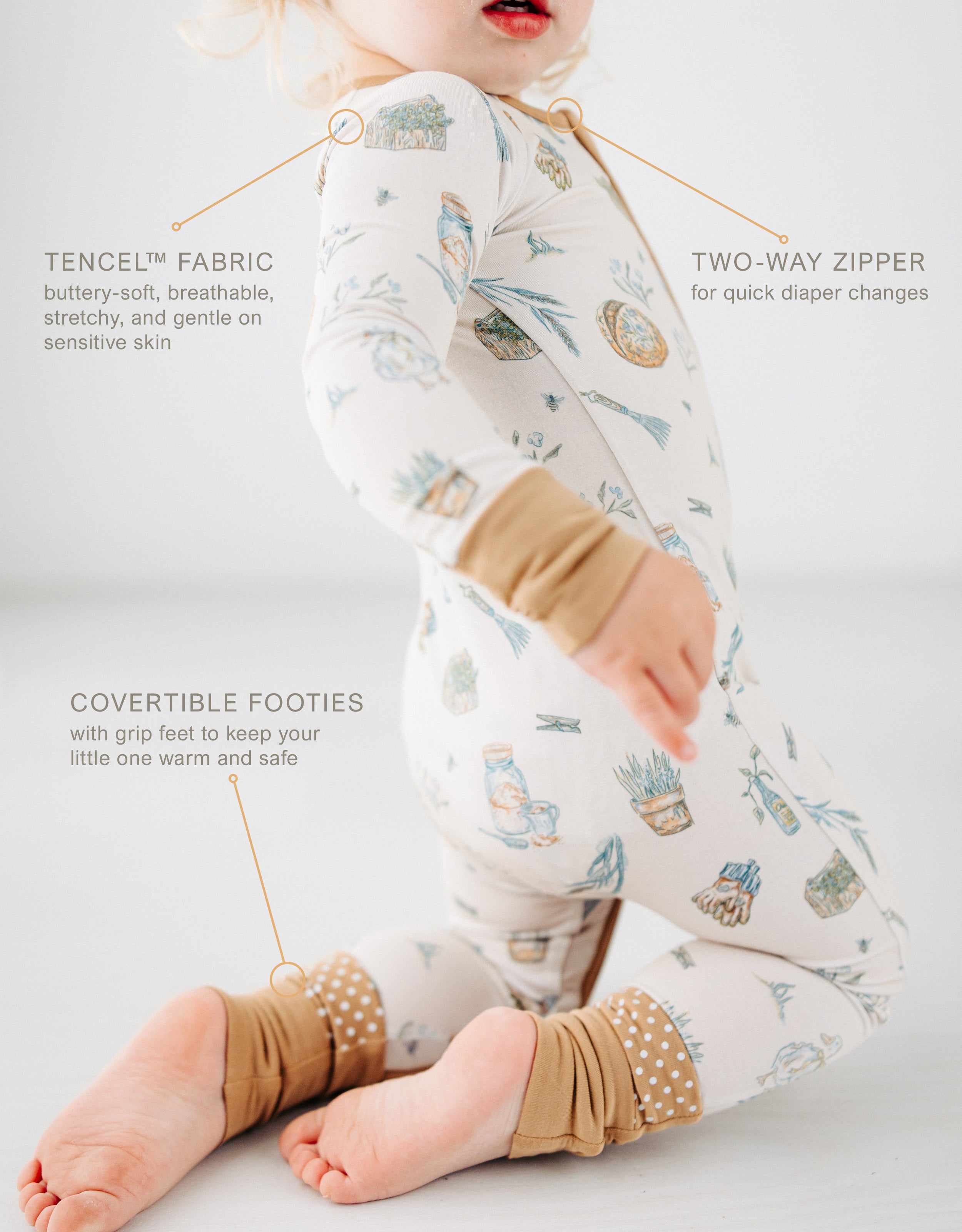 close up of little girl crawling with Meadow Lane Kids Heirloom Homestead TENCEL toddler sleeper on